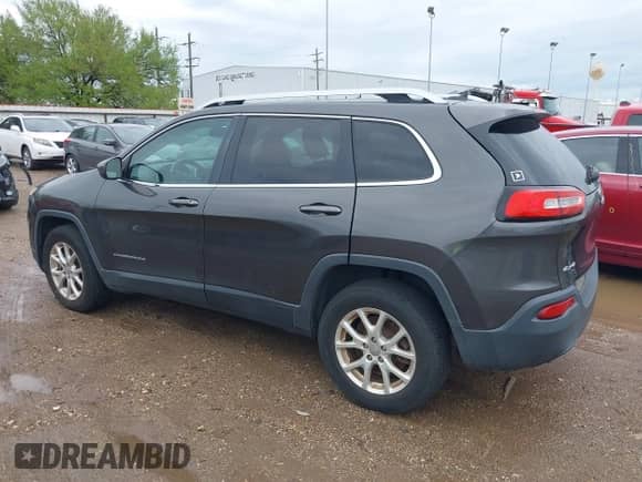 2014 Jeep Cherokee Latitude with VIN 1C4PJMCBXEW250804, listed as a IAAI auction lot 41874944 with 93,171 mi miles and . Bid and sale history available at DreamBid. Image 3.