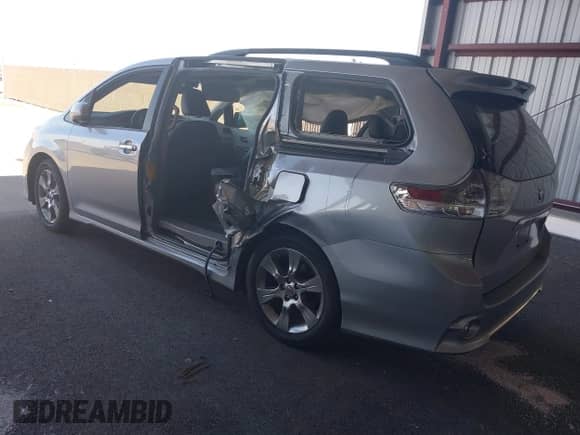 2014 Toyota Sienna SE with VIN 5TDXK3DC3ES495233, listed as a IAAI auction lot 43173582 with Not provided miles and . Bid and sale history available at DreamBid. Image 3.