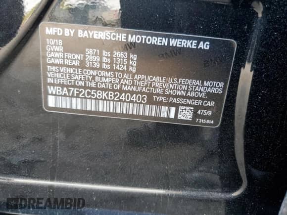 2019 BMW 7 Series 750i xDrive with VIN WBA7F2C58KB240403, listed as a Copart auction lot 84191915 with 56,854 mi miles and Salvage title. Bid and sale history available at DreamBid. Image 12.