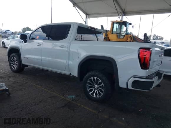 2021 GMC Sierra 1500 AT4 with VIN 3GTP9EED2MG414055, listed as a IAAI auction lot 43195867 with 101,924 mi miles and . Bid and sale history available at DreamBid. Image 3.