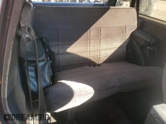 1990 Chevrolet Blazer with VIN 1GNCS18Z2L8113073, listed as a Copart auction lot 87676865 with 22,827 mi miles and Salvage title. Bid and sale history available at DreamBid. Image 10.