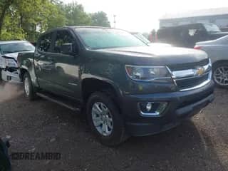 2015 Chevrolet Colorado 4WD LT z VIN 1GCGTBE30F1252516, wystawiony jako IAAI lot #42727647 z przebiegiem 86 999 mil mil oraz . Historia ofert i sprzedaży dostępna na DreamBid. Obrazek 1.