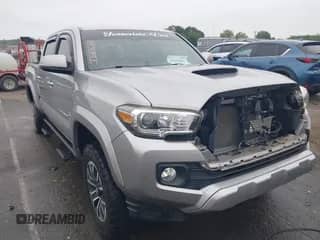 2020 Toyota Tacoma SR5 with VIN 3TMCZ5ANXLM296379, listed as a IAAI auction lot 42699808 with 39,765 mi miles and . Bid and sale history available at DreamBid. Image 1.