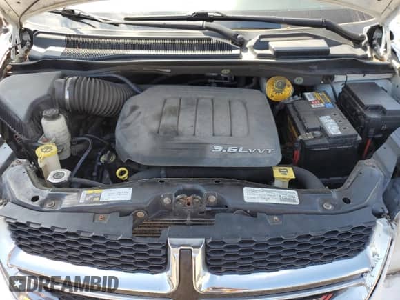 2015 Dodge Grand Caravan SXT z VIN 2C4RDGCGXFR549183, wystawiony jako Copart lot #71007425 z przebiegiem 203 178 mil mil oraz Szkoda całkowita • Salvage title. Historia ofert i sprzedaży dostępna na DreamBid. Obrazek 12.
