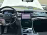 2023 Jeep Grand Cherokee Overland z VIN 1C4RJHDG3PC6464, wystawiony jako Copart lot #67408165 z przebiegiem 19 mil mil oraz Czysty tytuł • Clean title. Historia ofert i sprzedaży dostępna na DreamBid. Obrazek 9.