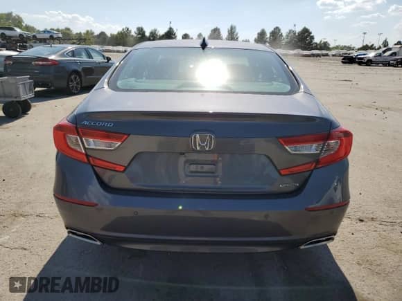 2018 Honda Accord Touring z VIN 1HGCV1F91JA004775, wystawiony jako Copart lot #71089465 z przebiegiem 28 780 mil mil oraz Szkoda całkowita • Salvage title. Historia ofert i sprzedaży dostępna na DreamBid. Obrazek 6.
