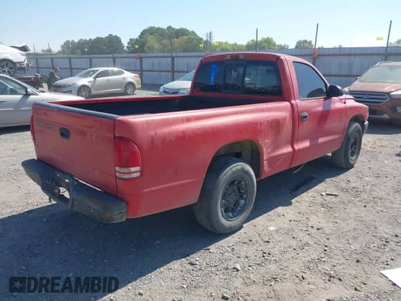 1999 Dodge Dakota SLT with VIN 1B7FL26X3XS173253, listed as a IAAI auction lot 43366312 with 295,534 mi miles and . Bid and sale history available at DreamBid. Image 4.
