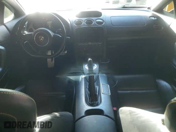 2005 Lamborghini Gallardo с VIN ZHWGU11S65LA02165, выставлен на аукционе Copart как лот 48230615 с пробегом 42 121 миль миль и Списание • Salvage title. История ставок и продаж доступна на DreamBid. Изображение 8.