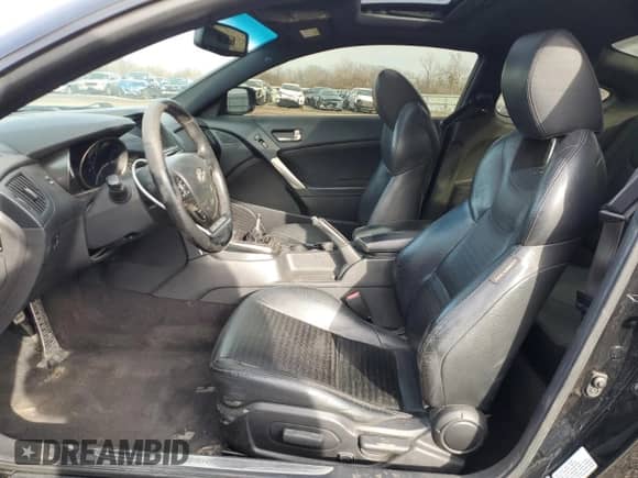 2013 Hyundai Genesis Coupe Track z VIN KMHHU6KJ4DU089727, wystawiony jako Copart lot #50002495 z przebiegiem 99 869 mil mil oraz Szkoda całkowita • Salvage title. Historia ofert i sprzedaży dostępna na DreamBid. Obrazek 7.