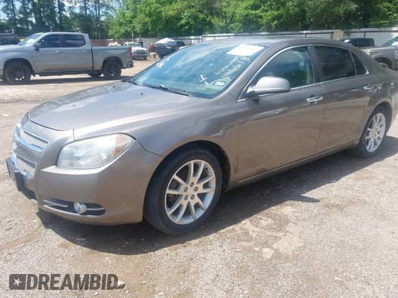 2012 Chevrolet Malibu LTZ z VIN 1G1ZG5E73CF146618, wystawiony jako IAAI lot #42333042 z przebiegiem 192 772 mil mil oraz . Historia ofert i sprzedaży dostępna na DreamBid. Obrazek 2.