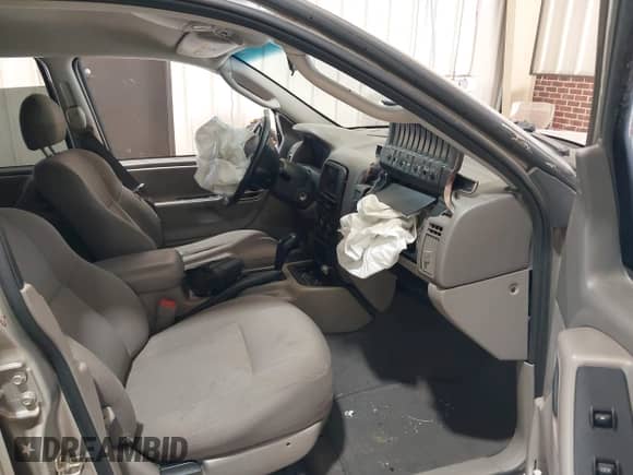 2003 Jeep Grand Cherokee Laredo z VIN 1J4GX48S23C539112, wystawiony jako IAAI lot #42735853 z przebiegiem 271 813 mil mil oraz . Historia ofert i sprzedaży dostępna na DreamBid. Obrazek 5.