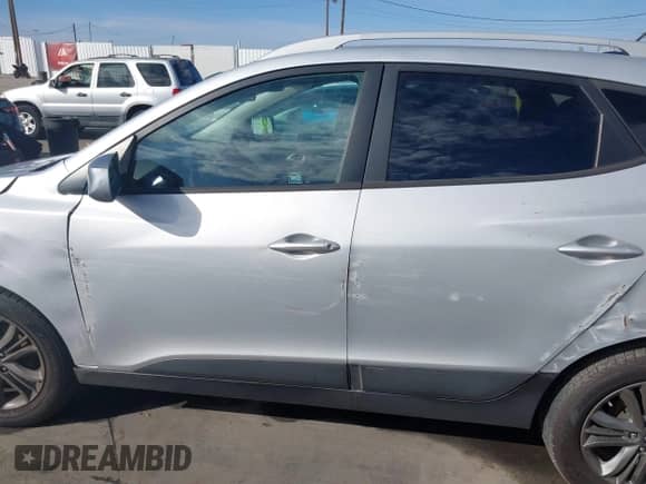 2015 Hyundai Tucson SE with VIN KM8JU3AG7FU963562, listed as a IAAI auction lot 41620894 with 171,382 mi miles and . Bid and sale history available at DreamBid. Image 15.