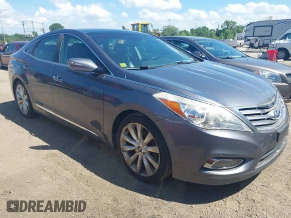 2012 Hyundai Azera with VIN KMHFH4JGXCA174819, listed as a IAAI auction lot 42579424 with 160,896 mi miles and . Bid and sale history available at DreamBid. Image 1.