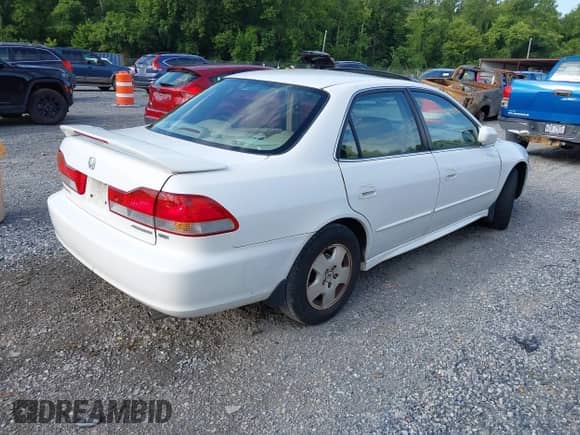 2002 Honda Accord EX z VIN 1HGCG16542A023524, wystawiony jako IAAI lot #42748973 z przebiegiem 81 586 mil mil oraz . Historia ofert i sprzedaży dostępna na DreamBid. Obrazek 4.