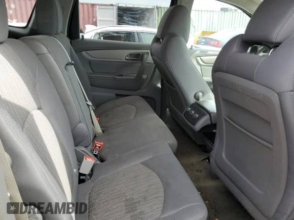 2015 Chevrolet Traverse LS z VIN 1GNKVFED6FJ115110, wystawiony jako Copart lot #81032035 z przebiegiem 120 070 mil mil oraz Szkoda całkowita • Salvage title. Historia ofert i sprzedaży dostępna na DreamBid. Obrazek 10.