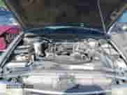 2000 Chevrolet Blazer LS z VIN 1GNCT18W6YK284227, wystawiony jako IAAI lot #42992936 z przebiegiem 155 138 mil mil oraz . Historia ofert i sprzedaży dostępna na DreamBid. Obrazek 10.