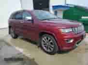 2018 Jeep Grand Cherokee Overland z VIN 1C4RJFCG2JC458039, wystawiony jako Copart lot #68192835 z przebiegiem 134 115 mil mil oraz Czysty tytuł • Clean title. Historia ofert i sprzedaży dostępna na DreamBid. Obrazek 4.