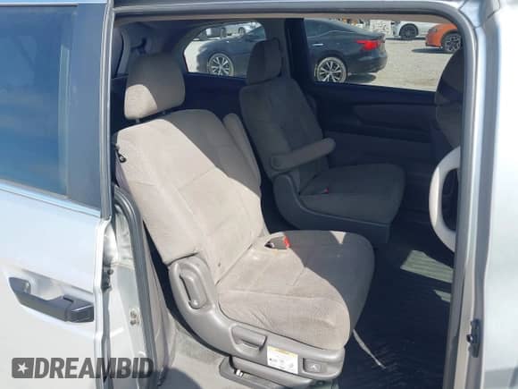 2011 Honda Odyssey LX with VIN 5FNRL5H2XBB028555, listed as a IAAI auction lot 43194763 with 164,504 mi miles and . Bid and sale history available at DreamBid. Image 8.