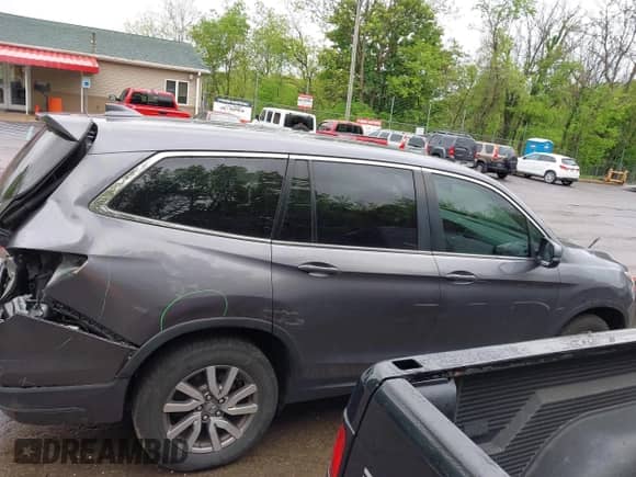 2022 Honda Pilot EX-L z VIN 5FNYF5H55NB006660, wystawiony jako IAAI lot #42240607 z przebiegiem 55 632 mil mil oraz . Historia ofert i sprzedaży dostępna na DreamBid. Obrazek 13.