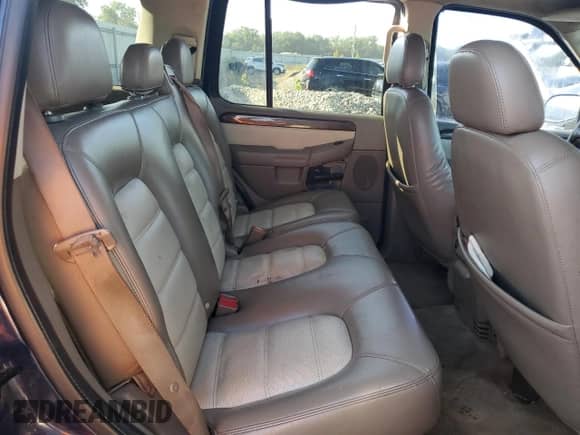 2004 Ford Explorer Eddie Bauer with VIN 1FMZU74W44UB78040, listed as a Copart auction lot 84029215 with 197,729 mi miles and Salvage title. Bid and sale history available at DreamBid. Image 11.