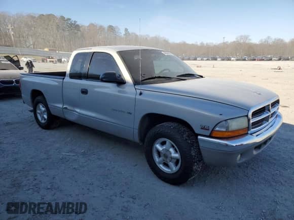 1998 Dodge Dakota SLT with VIN 1B7GL22XXWS563954, listed as a Copart auction lot 46836855 with 134,553 mi miles and Salvage title. Bid and sale history available at DreamBid. Image 4.