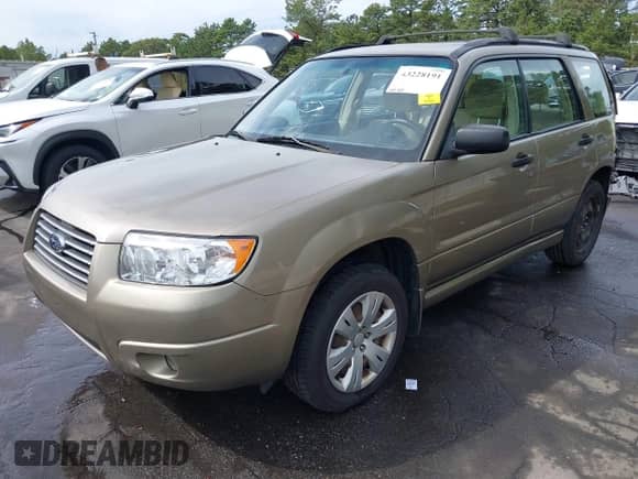 2008 Subaru Forester X with VIN JF1SG63618H721678, listed as a IAAI auction lot 43228191 with 204,965 mi miles and . Bid and sale history available at DreamBid. Image 2.