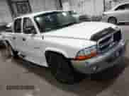 2001 Dodge Dakota Sport with VIN 1B7HL2AX21S259774, listed as a IAAI auction lot 41165907 with 311,576 mi miles and . Bid and sale history available at DreamBid. Image 1.