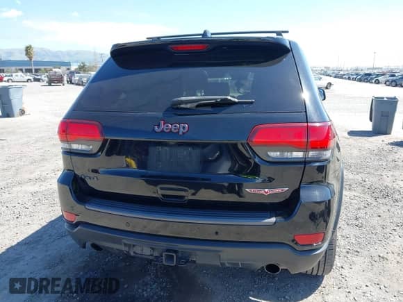 2020 Jeep Grand Cherokee Trailhawk with VIN 1C4RJFLG4LC118975, listed as a IAAI auction lot 41895950 with 106,638 mi miles and . Bid and sale history available at DreamBid. Image 16.