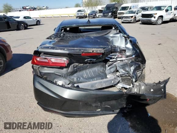 2018 Chevrolet Camaro 1LS с VIN 1G1FA1RS9J0188125, выставлен на аукционе Copart как лот 79361534 с пробегом 68 420 миль миль и Списание • Salvage title. История ставок и продаж доступна на DreamBid. Изображение 6.