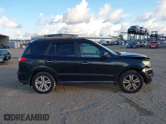2011 Hyundai Santa Fe Limited with VIN 5XYZKDAG9BG050705, listed as a IAAI auction lot 43069498 with 224,544 mi miles and . Bid and sale history available at DreamBid. Image 13.