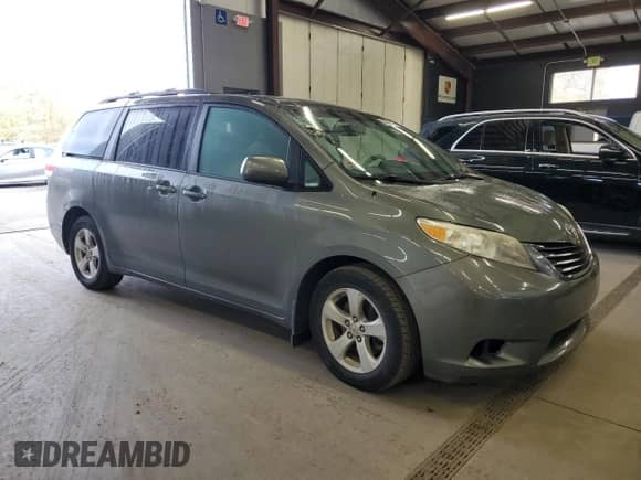 2011 Toyota Sienna LE with VIN 5TDKK3DC8BS052114, listed as a Copart auction lot 89858215 with 263,095 mi miles and Clean title. Bid and sale history available at DreamBid. Image 4.