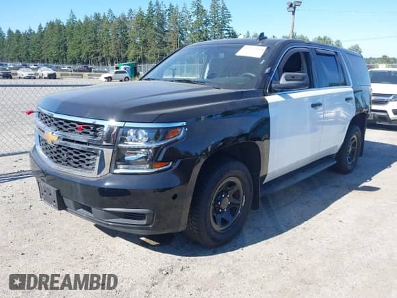 2017 Chevrolet Tahoe Commercial with VIN 1GNSKDEC9HR210754, listed as a IAAI auction lot 42717994 with 73,943 mi miles and . Bid and sale history available at DreamBid. Image 2.