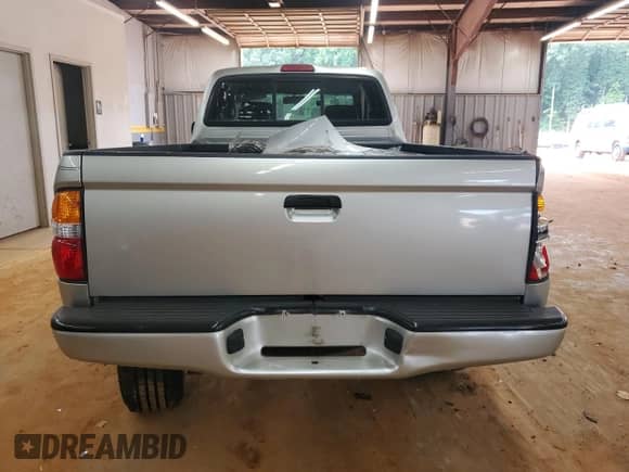 2003 Toyota Tacoma PreRunner with VIN 5TESN92N43Z220494, listed as a Copart auction lot 71327755 with 164,737 mi miles and Salvage title. Bid and sale history available at DreamBid. Image 6.