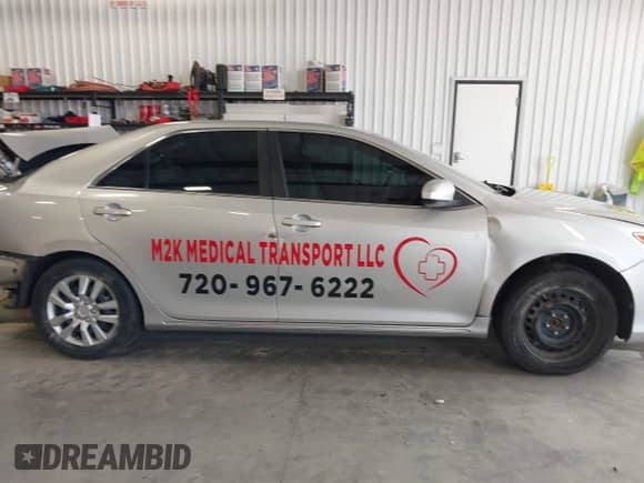 2013 Toyota Camry LE z VIN 4T1BD1FK8DU064728, wystawiony jako IAAI lot #42398146 z przebiegiem 100 867 mil mil oraz . Historia ofert i sprzedaży dostępna na DreamBid. Obrazek 14.