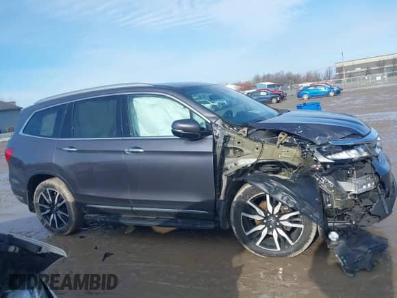 2022 Honda Pilot Elite z VIN 5FNYF6H0XNB014165, wystawiony jako IAAI lot #41196850 z przebiegiem 107 032 mil mil oraz . Historia ofert i sprzedaży dostępna na DreamBid. Obrazek 14.