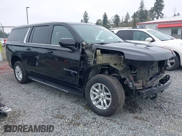 2023 Chevrolet Suburban LT z VIN 1GNSKCKD8PR215417, wystawiony jako IAAI lot #43117847 z przebiegiem 63 479 mil mil oraz . Historia ofert i sprzedaży dostępna na DreamBid. Obrazek 1.