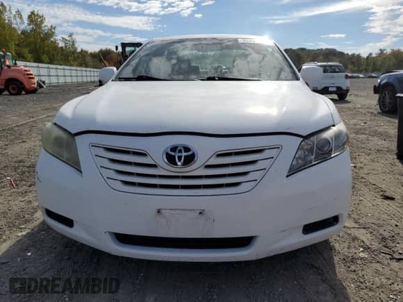 2009 Toyota Camry LE z VIN 4T1BE46KX9U806116, wystawiony jako Copart lot #85261255 z przebiegiem 196 982 mil mil oraz Czysty tytuł • Clean title. Historia ofert i sprzedaży dostępna na DreamBid. Obrazek 5.