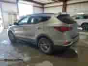 2017 Hyundai Santa Fe 2.4L z VIN 5NMZUDLB0HH012693, wystawiony jako Copart lot #85827455 z przebiegiem 139 188 mil mil oraz Szkoda całkowita • Salvage title. Historia ofert i sprzedaży dostępna na DreamBid. Obrazek 2.