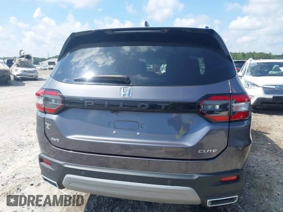 2023 Honda Pilot Elite with VIN 5FNYG1H8XPB040628, listed as a IAAI auction lot 42718726 with 28,663 mi miles and . Bid and sale history available at DreamBid. Image 16.