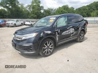 2020 Honda Pilot Touring 8-Passenger z VIN 5FNYF6H9XLB025131, wystawiony jako Copart lot #65047365 z przebiegiem 74 920 mil mil oraz Szkoda całkowita • Salvage title. Historia ofert i sprzedaży dostępna na DreamBid. Obrazek 1.