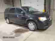 2014 Dodge Grand Caravan American Value with VIN 2C4RDGBG7ER478377, listed as a Copart auction lot 82412495 with 100,330 mi miles and Clean title. Bid and sale history available at DreamBid. Image 4.
