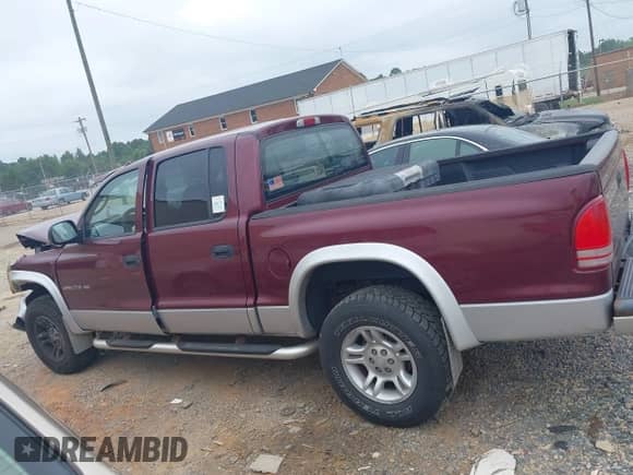 2002 Dodge Dakota SLT with VIN 1B7HG48N72S534240, listed as a IAAI auction lot 42718329 with 176,675 mi miles and . Bid and sale history available at DreamBid. Image 14.