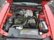 1996 Ford Mustang с VIN 1FALP4046TF159504, выставлен на аукционе Copart как лот 81761655 с пробегом 31 575 миль миль и Списание • Salvage title. История ставок и продаж доступна на DreamBid. Изображение 11.