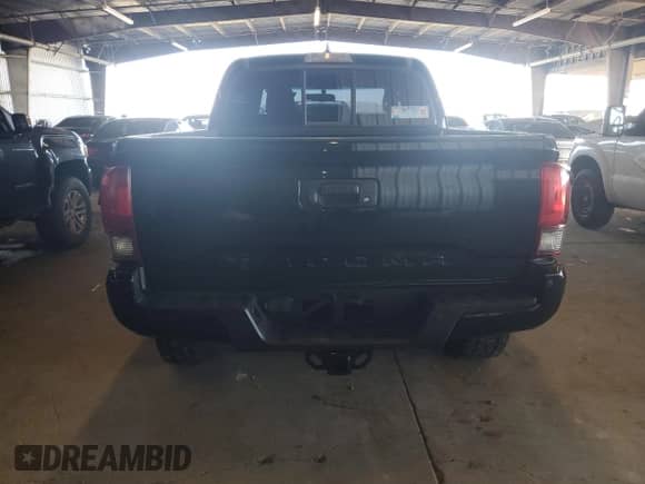 2016 Toyota Tacoma SR5 with VIN 3TMAZ5CN4GM003232, listed as a Copart auction lot 82364945 with 142,997 mi miles and Salvage title. Bid and sale history available at DreamBid. Image 6.