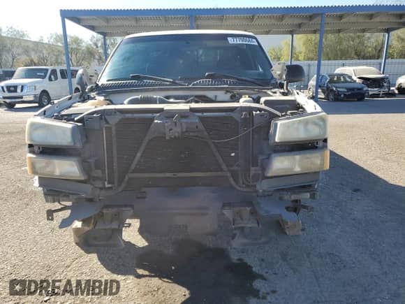 2006 Chevrolet Silverado 1500 LS z VIN 1GCEC19X16Z267767, wystawiony jako Copart lot #77700684 z przebiegiem Nie podano mil oraz Szkoda całkowita • Salvage title. Historia ofert i sprzedaży dostępna na DreamBid. Obrazek 5.