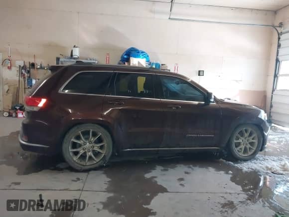 2015 Jeep Grand Cherokee Summit с VIN 1C4RJFJT2FC678675, выставлен на аукционе IAAI как лот 41507468 с пробегом 149 763 миль миль и . История ставок и продаж доступна на DreamBid. Изображение 13.