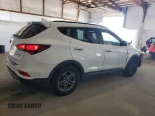 2018 Hyundai Santa Fe 2.4L z VIN 5NMZU3LB5JH089074, wystawiony jako Copart lot #86227655 z przebiegiem 84 861 mil mil oraz Szkoda całkowita • Salvage title. Historia ofert i sprzedaży dostępna na DreamBid. Obrazek 3.