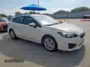 2018 Subaru Impreza Premium with VIN 4S3GTAB67J3735376, listed as a Copart auction lot 81866355 with 61,144 mi miles and Salvage title. Bid and sale history available at DreamBid. Image 4.