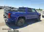 2024 Toyota Tacoma SR5 with VIN 3TMKB5FN4RM003206, listed as a Copart auction lot 64324035 with 8,012 mi miles and Salvage title. Bid and sale history available at DreamBid. Image 3.