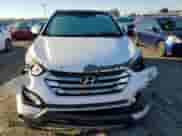 2015 Hyundai Santa Fe с VIN 5XYZWDLA2FG293470, выставлен на аукционе Copart как лот 87119555 с пробегом 168 704 миль миль и Списание • Salvage title. История ставок и продаж доступна на DreamBid. Изображение 5.